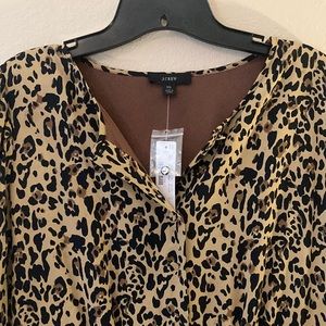Leopard-animal print dress in size 10. Colors: black, brown. Very classy!